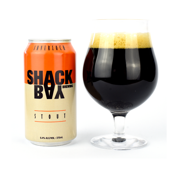 Shack Bay Brewing Stout can and glass with beer on a white background