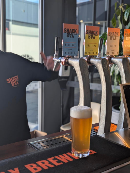 Shack Bay Brewing pouring beer at bar