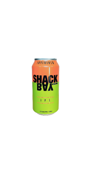 A 12 fl oz can of InterBlok Shag Box IPL beer, featuring a bright lime green and orange gradient label with bold black text, set against a plain white background.